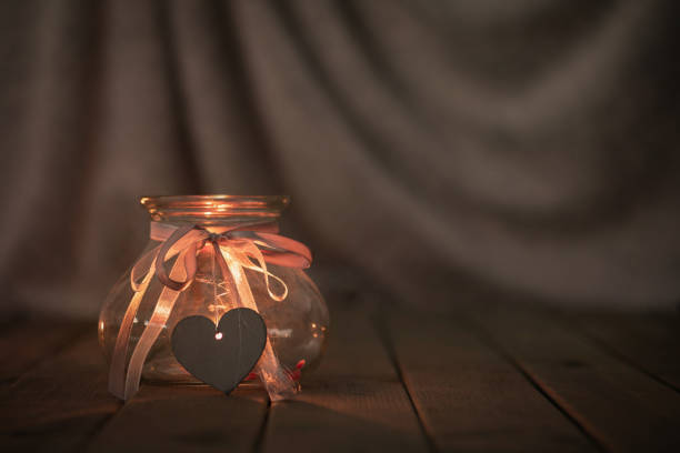 istock Merry Christmas with candle and light bokeh 1063449642