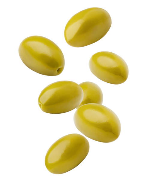 istock Falling olive isolated on white background, clipping path, full depth of field 1063456732