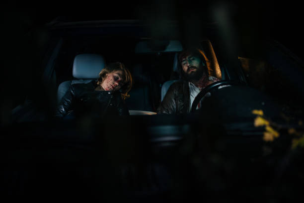 istock Man and woman in a car crash 1063456996