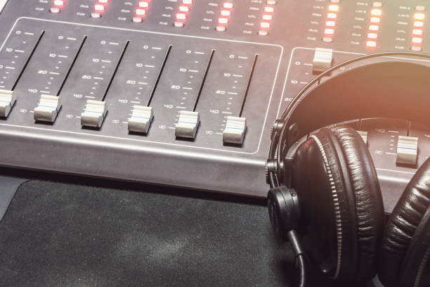 istock Close-up of boutique recording studio control desk. 1063459426