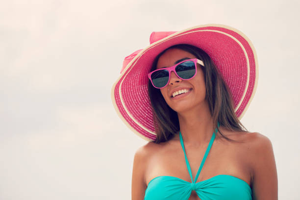 istock Smiling woman in sunhat 1063462126