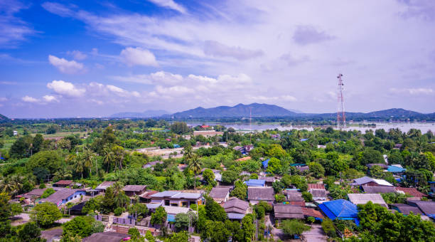 istock cityscape and blue sky with mountain background 1063466170