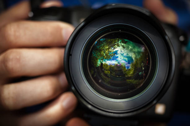istock Looking at the reflections in a camera lens 1063471612