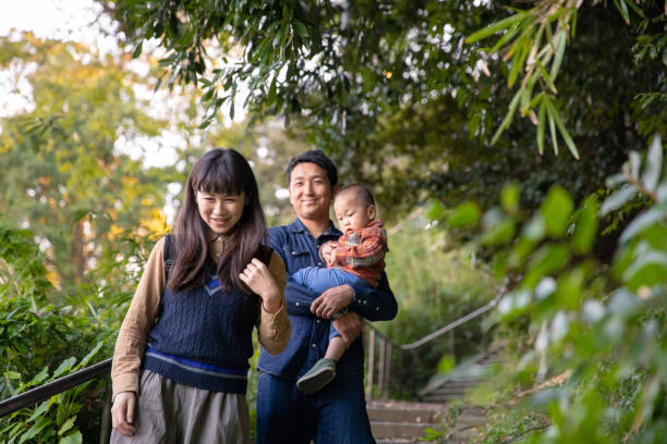 Young family hiking with little son