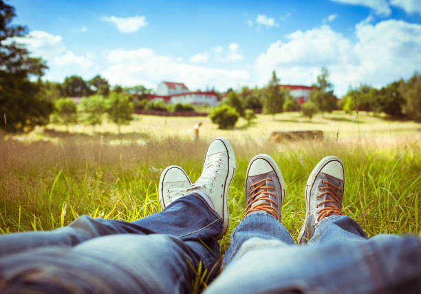 istock Young couple relaxing at the park 1063475648