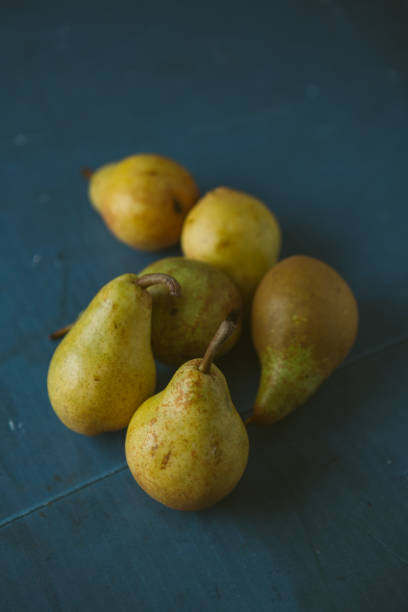 istock Pile of ripe fresh green pears 1063485134