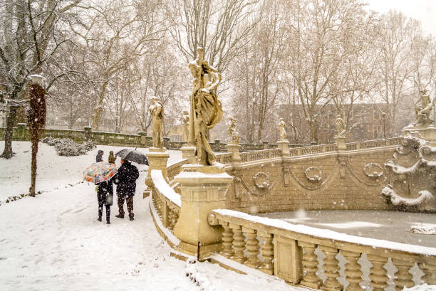 Snowfall in a public park in Turin (Piedmont, Italy). stock photo