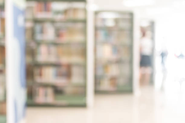 istock Blur school library or study room with book shelves for education background 1063497938