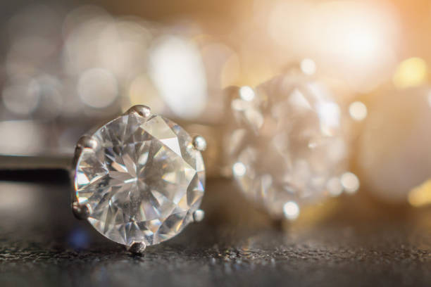 istock Jewelry diamond rings set on black background close up 1063498146