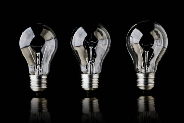 istock creativity startup business ideas concept with glow light bulb on black background 1063498208