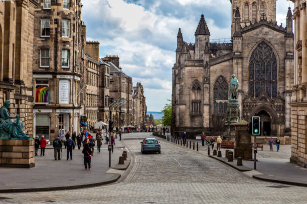 Edinburgh, Scotland - May 03, 2011: High Street in Old Town Edinburgh. The Royal Mile, a stretch of road connecting Edinburgh Castle with Holyrood Palace, the Queen's residence in Scotland.