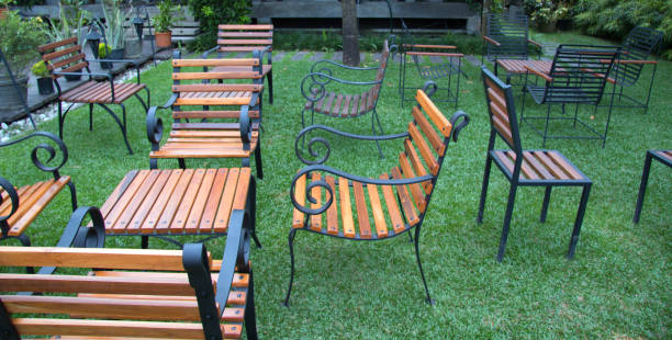 Close up shot of empty table and chairs in outdoor restaurant due to Covid 19 social distancing rule