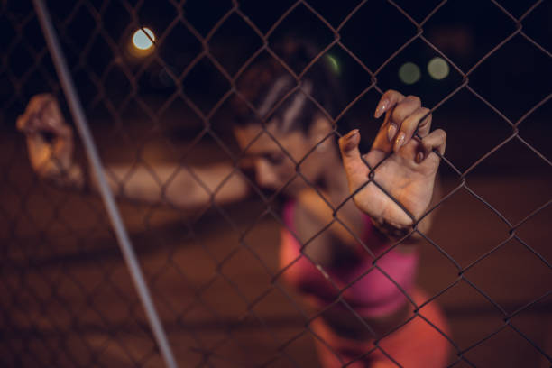 istock Urban girl training at night 1063527606