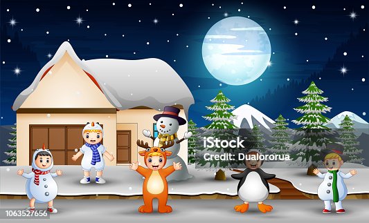 istock Children enjoy wearing different costumes in winter 1063527656