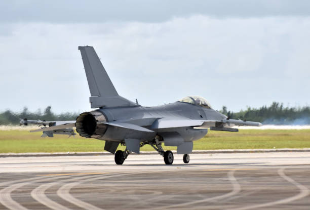 istock Air Force jetfighter taxiing before mission seen from behind 1063530276
