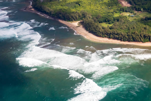 istock Overhead view of ocean waves on tropical island 1063532350