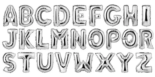 English alphabet from silver balloons isolated on white background