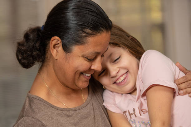 istock Hispanice Woman and her daughter 1063541178