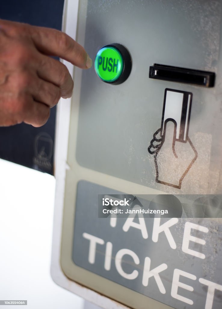 Push Ticket Mans Finger Pressing Take Ticket Button At Parking Garage Stock Photo ...