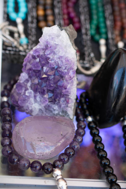 istock Raw violet amethyst rock with crystal ametist 1063557926