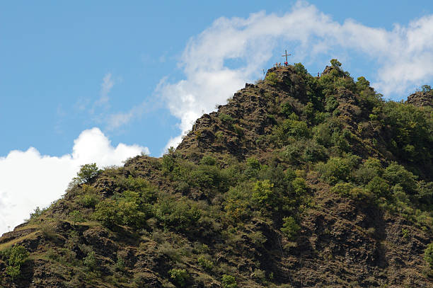 istock cross on the summit of a mountain 106356918