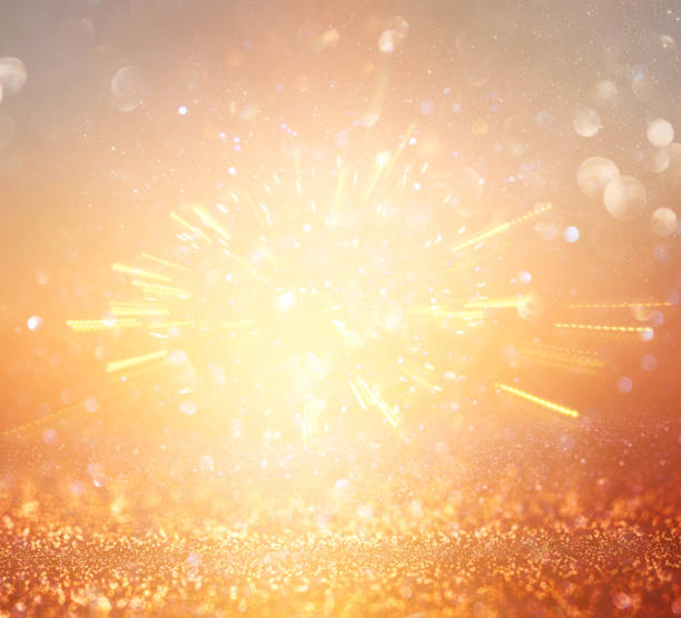 istock glitter vintage lights background. silver and gold. de-focused. 1063572264