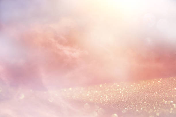 istock glitter vintage lights background. silver and gold. de-focused. 1063583116
