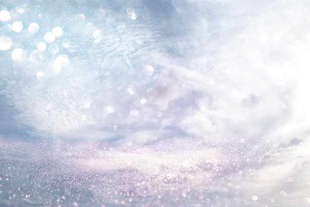 istock glitter vintage lights background. silver, blue, purple and gold. de-focused. 1063583208