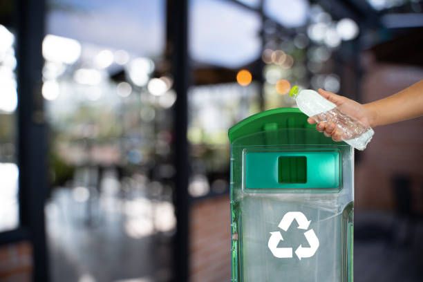 istock man hand putting plastic reuse for recycling concept environmental protection world recycle 1063587848