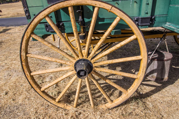 istock Old Wooden Wagon Wheel 1063592976