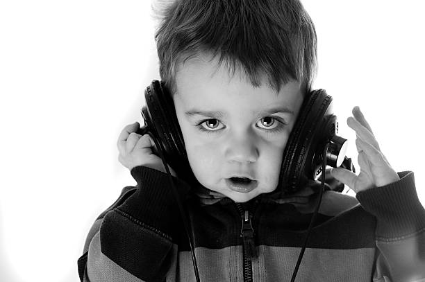 istock Black and white toddler with headphones. 106359632