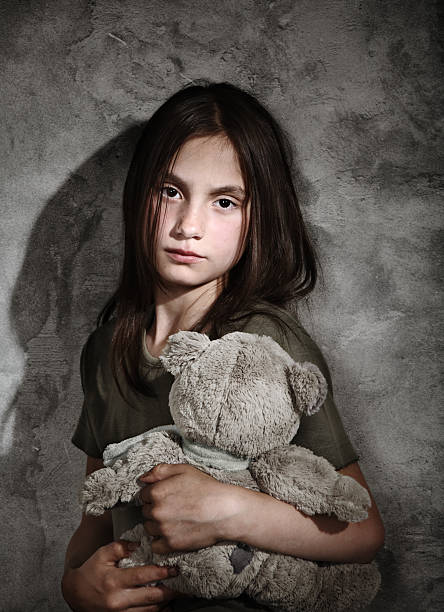 istock Sad little girl with toy 106359872