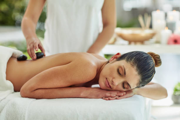 istock Targeting tense muscles with hot stones 1063606348