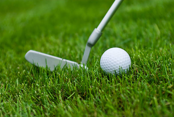 istock golf ball and club 106360882