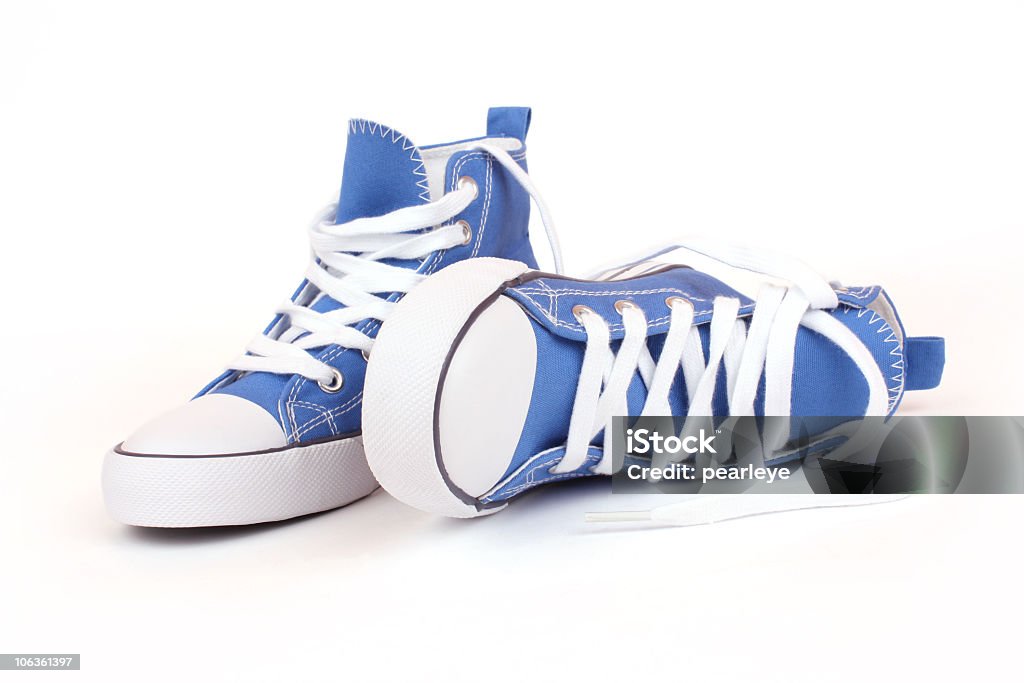 Picture Of Blue Converse Of Canvas Shoes With White Laces Stock Photo -  Download Image Now - iStock