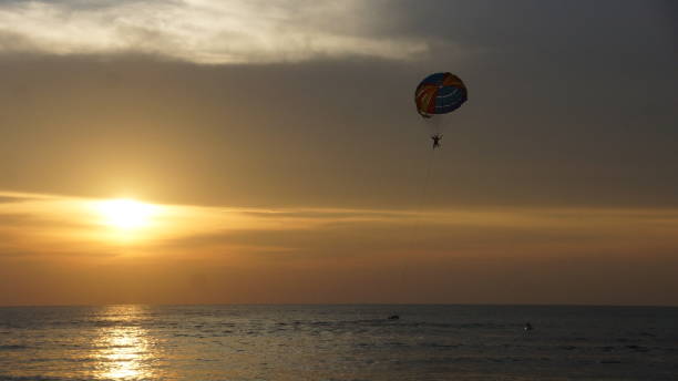 istock Sunset scene at Batu Ferringhi Beach in Penang 1063616010