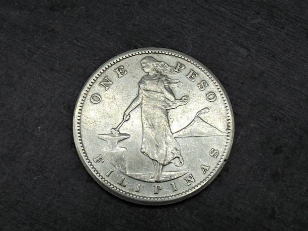 istock old coin of one Philippines Peso. 1063620862