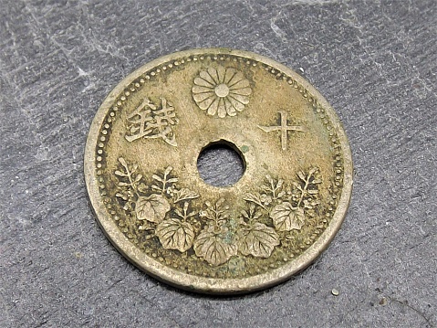 Bronze 25 para 1938 coin isolated on white background, Yugoslavia