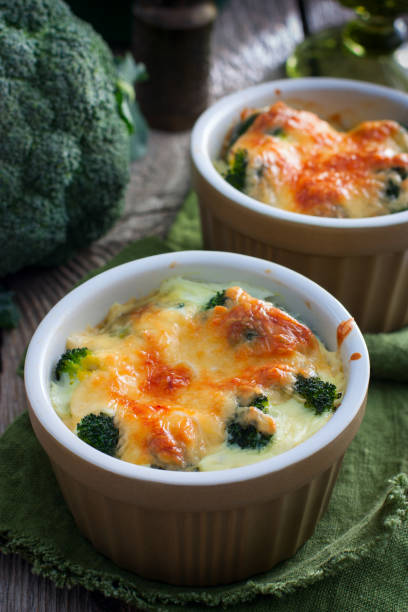 istock Broccoli baked with cheese in portions, selective focus 1063625970