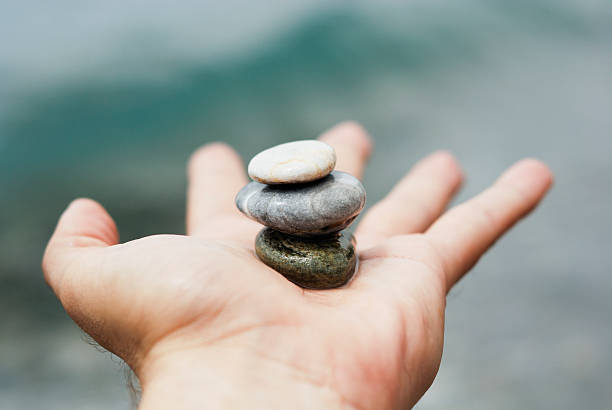 Balance on hand  theravada photos stock pictures, royalty-free photos & images