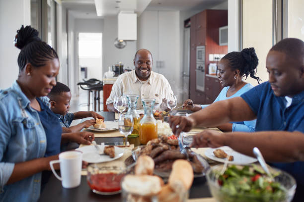 istock Multi-generational family having lunch at home 1063629552