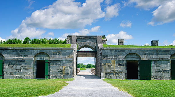 Tunnel of stone with light in the end, citadelle of Quebec city.