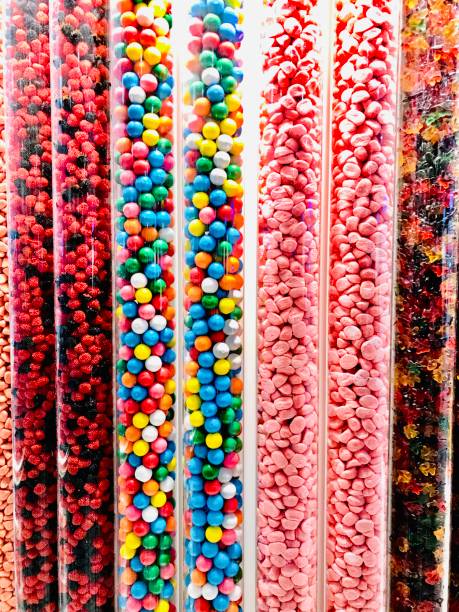 istock Colorful candies in the pipes 1063631236