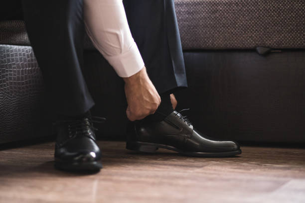 istock businessman clothes shoes, man getting ready for work,groom morning before wedding ceremony 1063631490