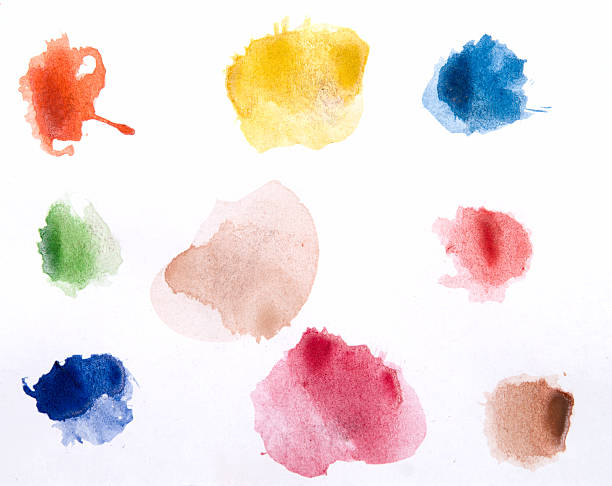 Watercolor paints on a white piece of paper ready to use colorful watercolor drops on white blob stock pictures, royalty-free photos & images