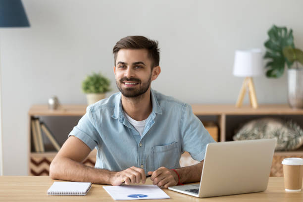 istock Businessman sitting at the desk in office 1063637520