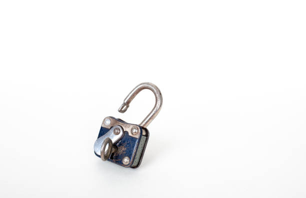 Vintage rusty padlock and key  isolated on white background with copy space