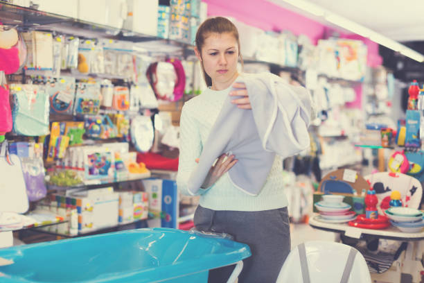 istock girl is choosing baby towel 1063652516