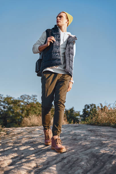 istock Young tourist blogger what walks at mountains. Bottom view 1063652670