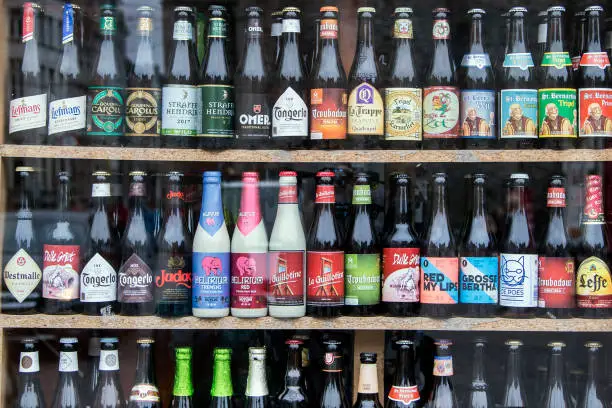 Abundance of beer brands in a store window in Belgium.